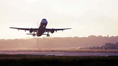 airplane taking off from runway